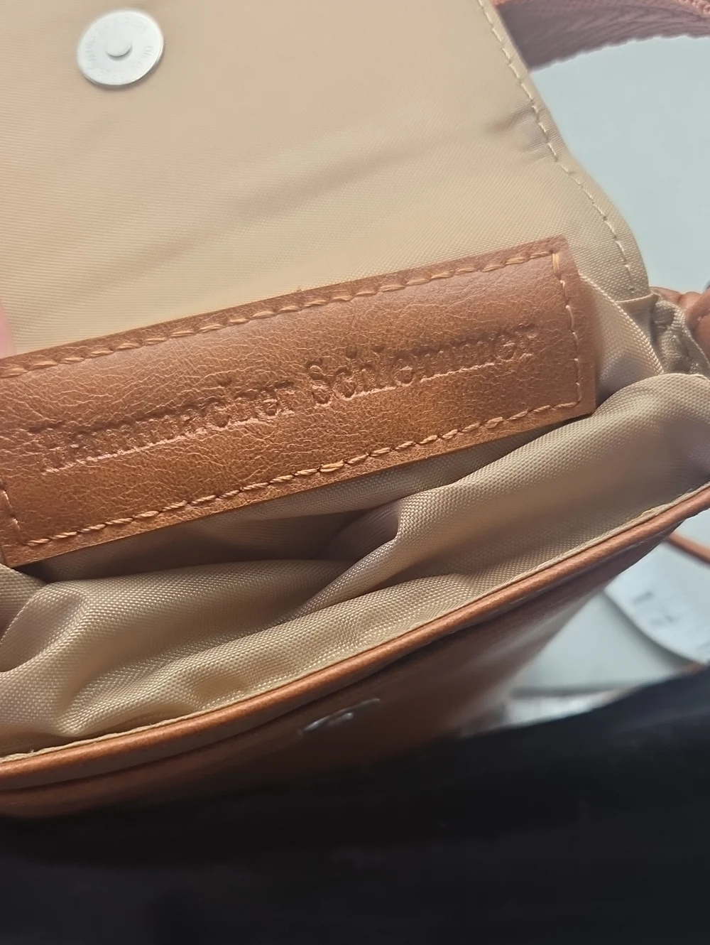 Hammacher Schlemmer • Wearable crossbody leather wallet